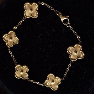 Gold Floral Clover Shaped Bracelet with Elegant Design